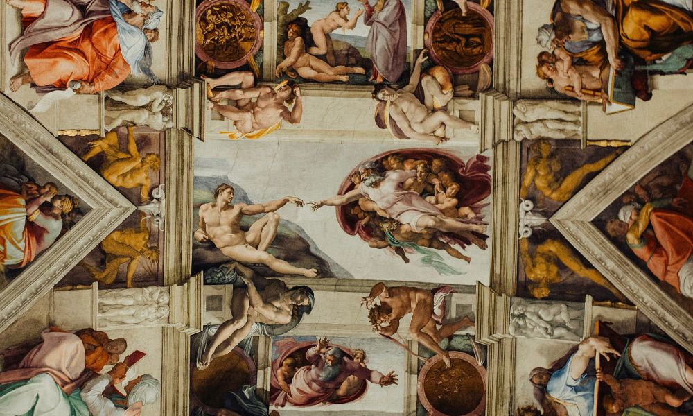 The Creation of Adam fresco by Michelangelo in the Vatican