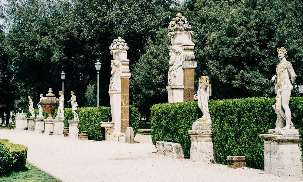 Villa Borghese Gardens in Rome with art, greenery, and historic features
