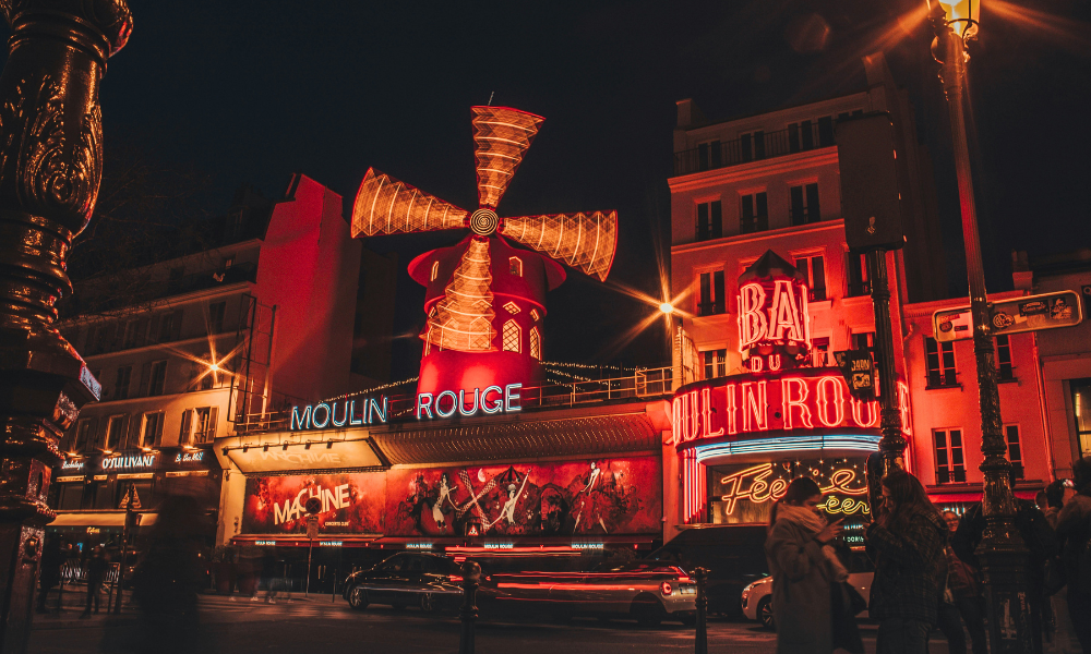 Moulin Rouge cabaret in Paris illuminated at night