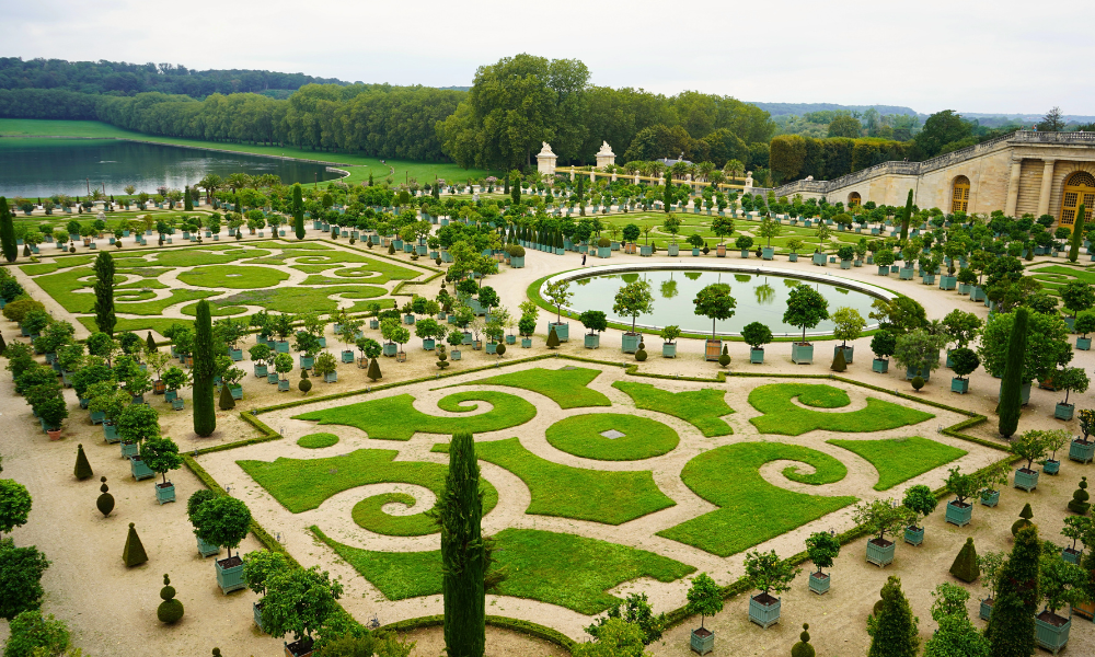 Gardens of Versailles in Paris with manicured lawns and fountains