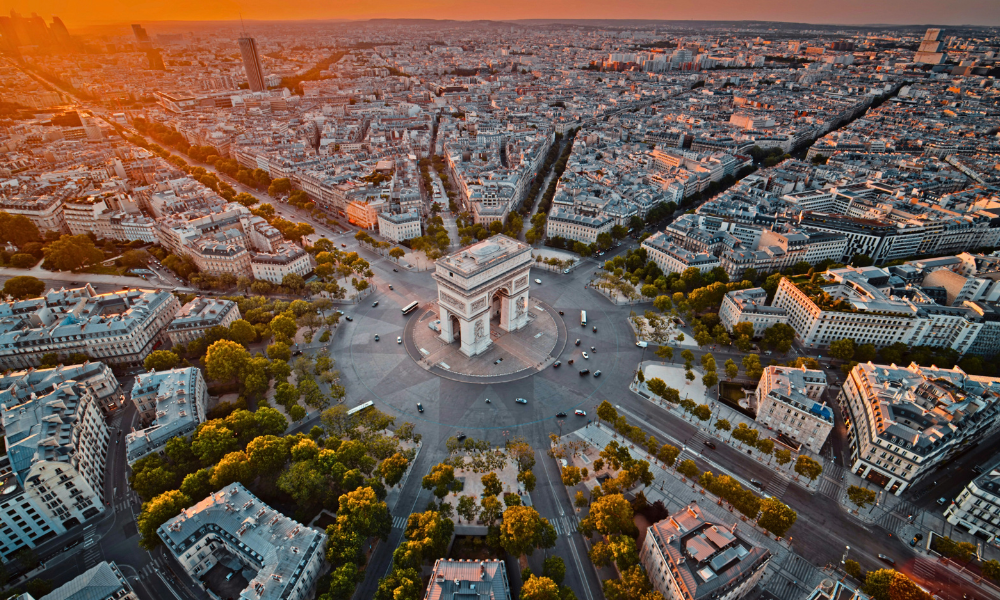 Aerial view of the Arc de Triomphe and the surrounding grand avenues of Paris