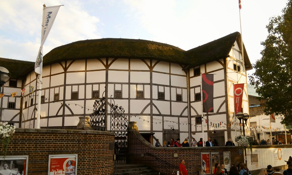 Exterior view of Shakespeare's Globe Theatre in London, showcasing the historic reconstruction of the 1599 theatre on the banks of the Thames.