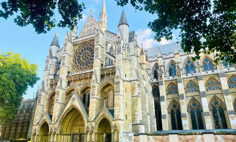 Exterior view of Westminster Abbey, the historic Gothic church in London known for royal coronations and ceremonies.