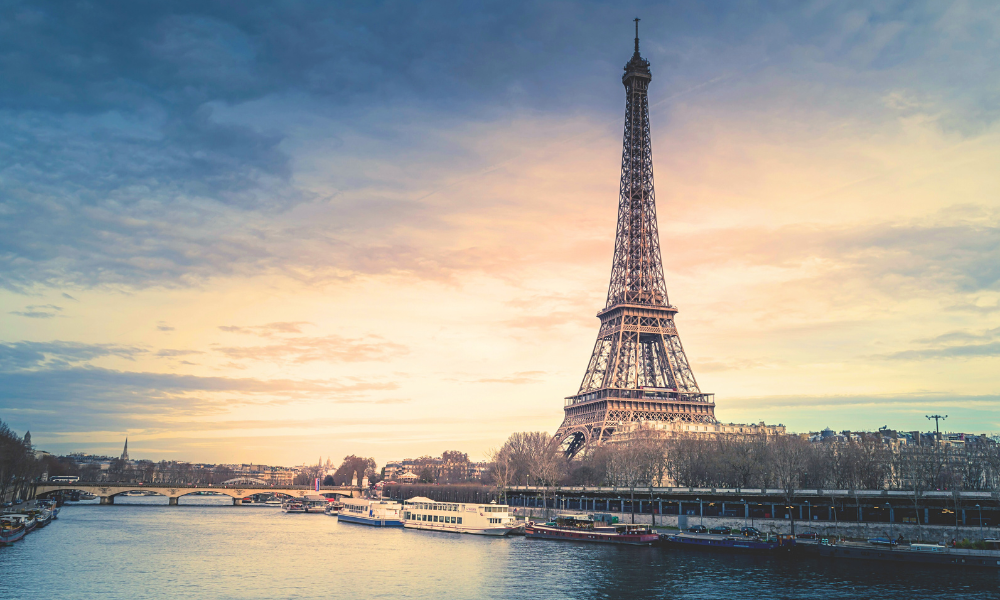 Eiffel Tower along the Seine River in Paris, showcasing a classic Parisian landmark and riverside scenery